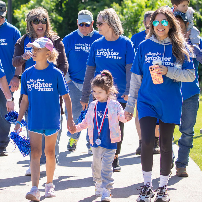 Chelsea Benitez and daughters at Dallas Walk Strong to Cure JM event