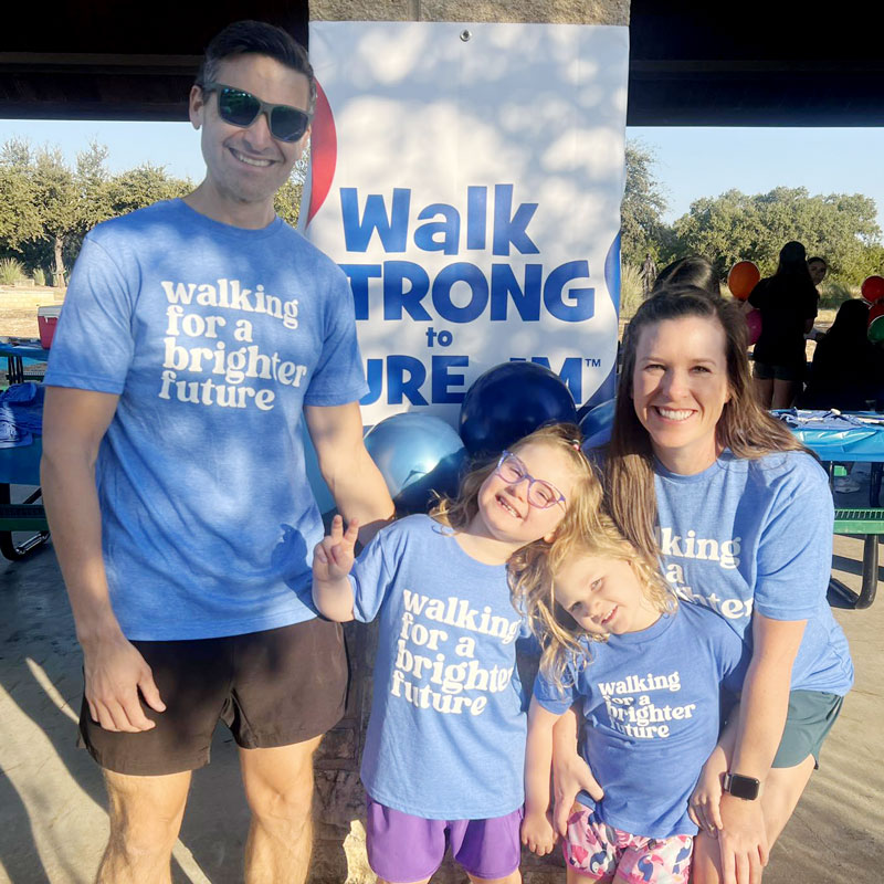 Diana & Ryan Reed and daughters at Austin Chapter Walk Strong to Cure JM event