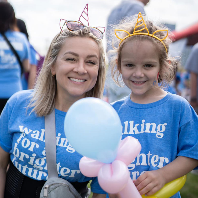Kelly Culver and daughter at Pittsburgh Chapter Walk Strong to Cure JM event