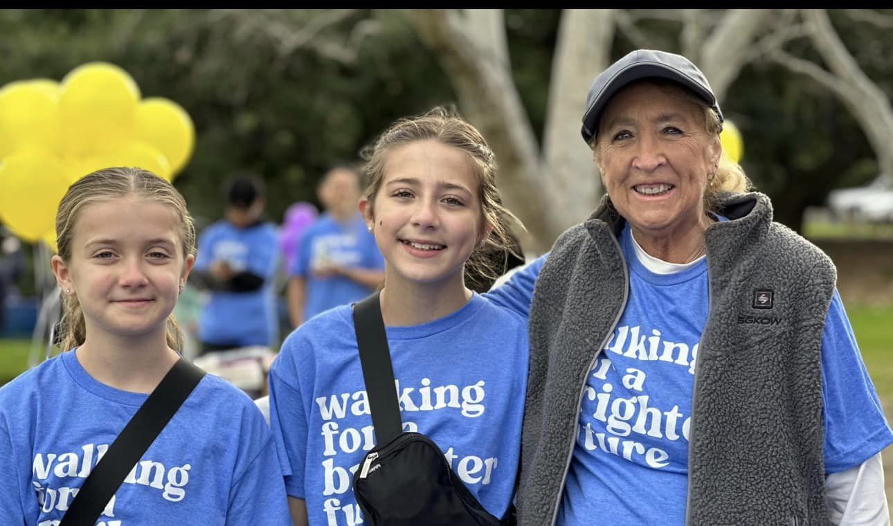 Anita and granddaughters at walk 2024