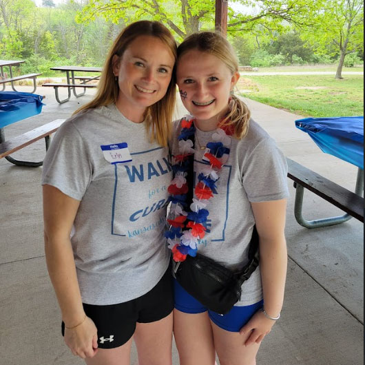 Erin Hicks and child at Kansas City Walk