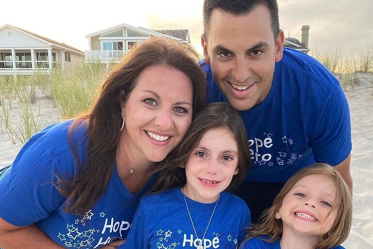 Natalia and family in Hope Hero shirts